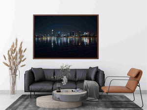 Night city skyline artwork with reflections for modern office decor.