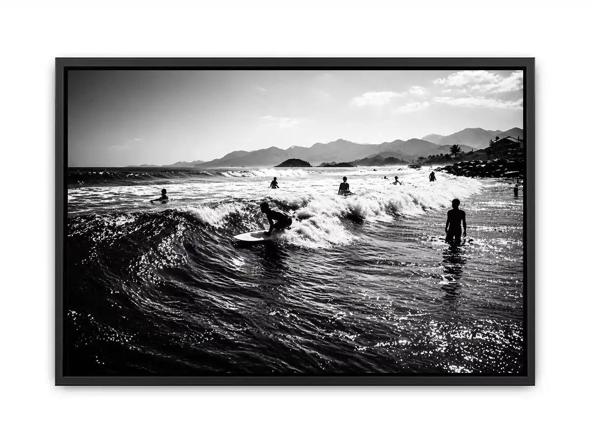 black and white surfing wave with surfers ocean wall art canvas
