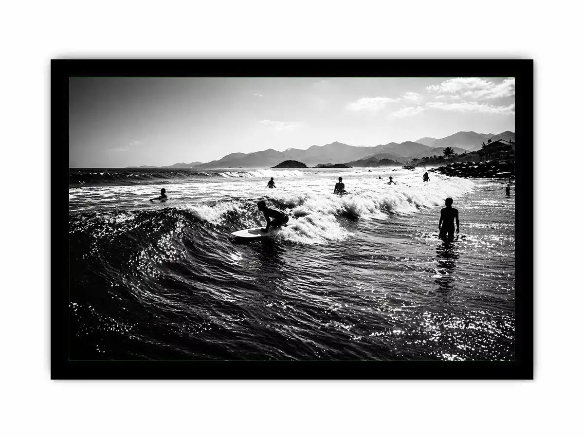 black and white surfing wave with surfers ocean wall art canvas
