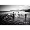 black and white surfing wave with surfers ocean wall art canvas