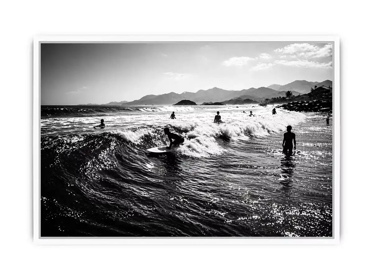 black and white surfing wave with surfers ocean wall art canvas
