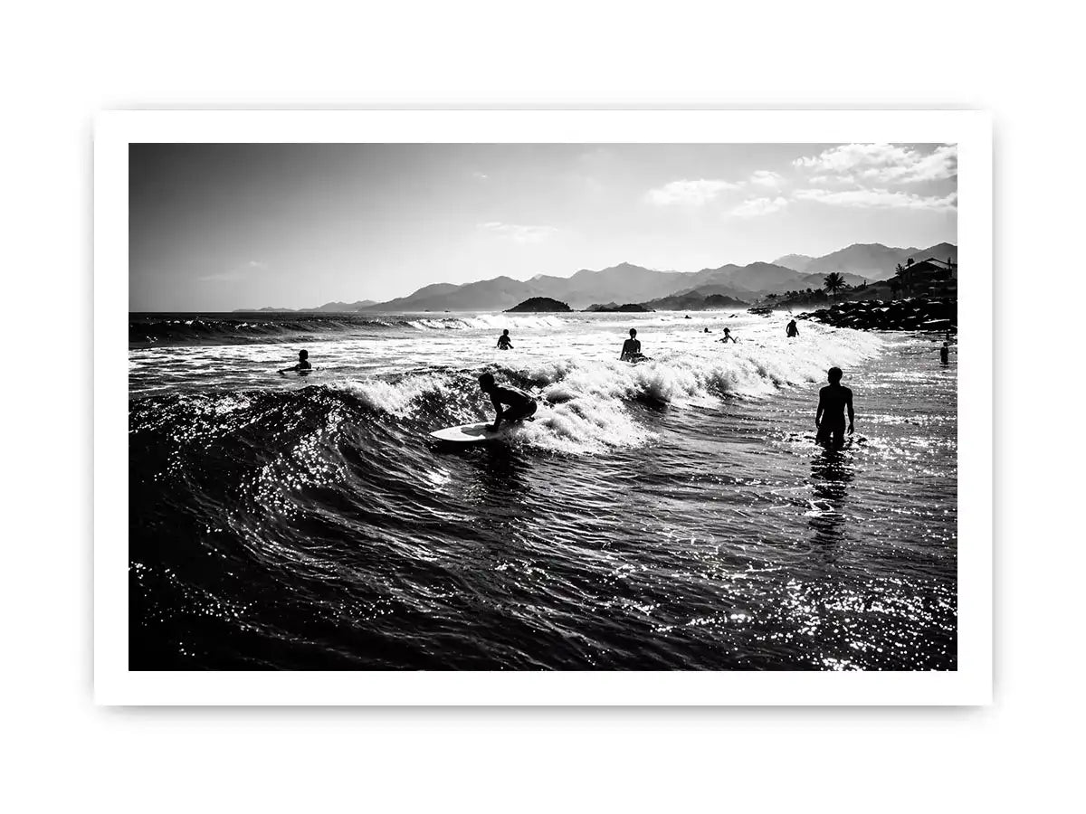 black and white surfing wave with surfers ocean wall art canvas