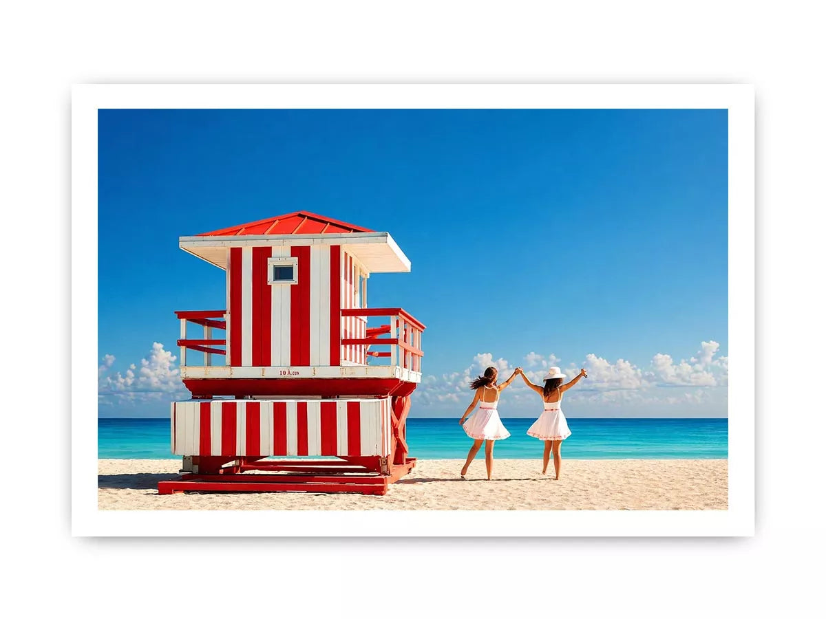 Minimal coastal beach scene with red lifeguard hut blue ocean and two women walking aesthetic wall art