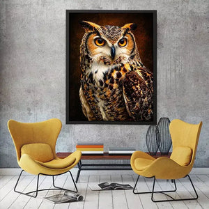 Realistic owl wall art with glowing golden eyes and detailed feathers