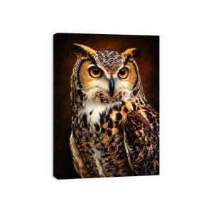 Realistic owl wall art with glowing golden eyes and detailed feathers