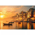sunset and boat in the  Ganga river varanasi india