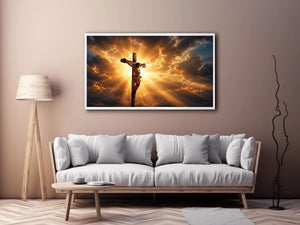 Jesus on the cross illuminated by heavenly golden light with dramatic clouds Christian wall art canvas print