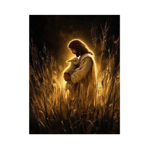Jesus holding lamb in glowing golden field Christian spiritual wall art canvas print