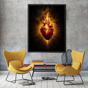 Burning sacred heart wall art with crown of thorns and glowing golden flames on dark background