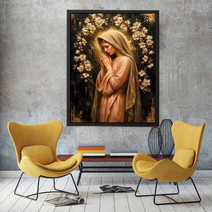 Luxury praying woman wall art with gold floral halo and blush pink spiritual canvas painting
