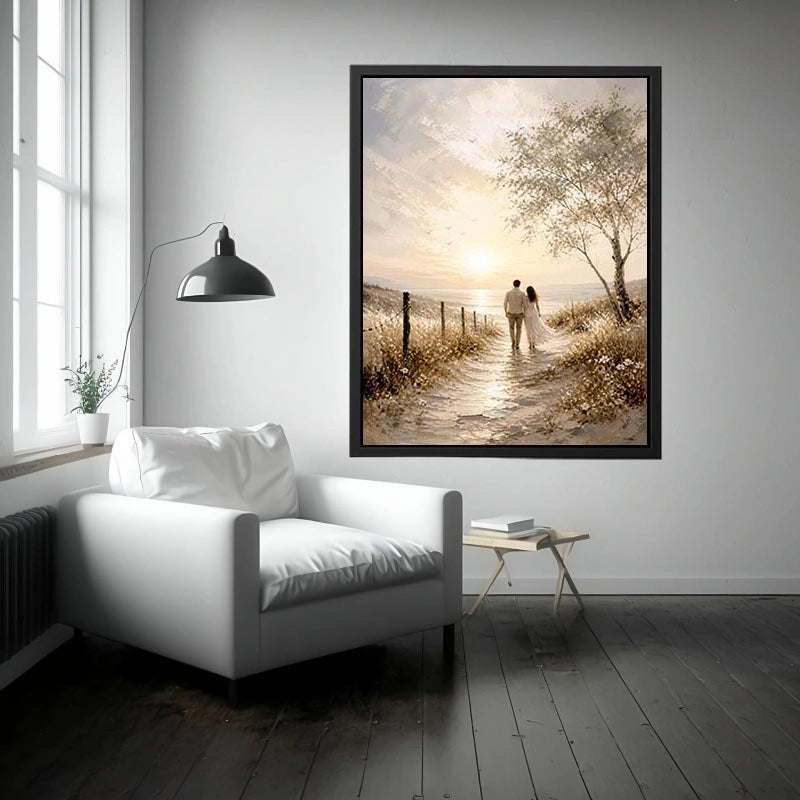 Romantic coastal wall art featuring a couple walking along a sunlit beach path with golden skies, ocean views, and soft wildflower scenery in a dreamy landscape painting.