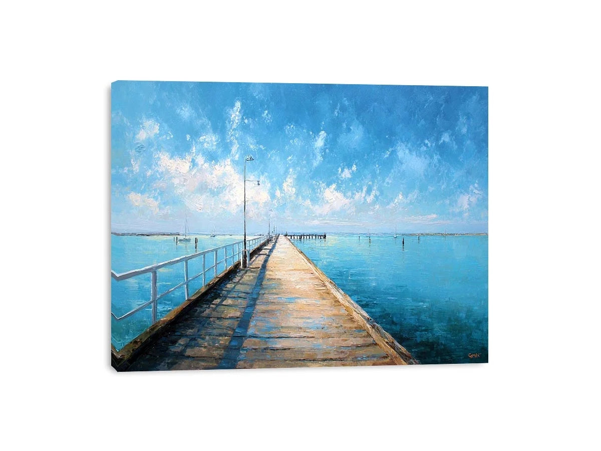 Coastal pier wall art featuring a sunlit boardwalk over calm blue ocean waters with textured impressionist brushstrokes and airy seaside tones.