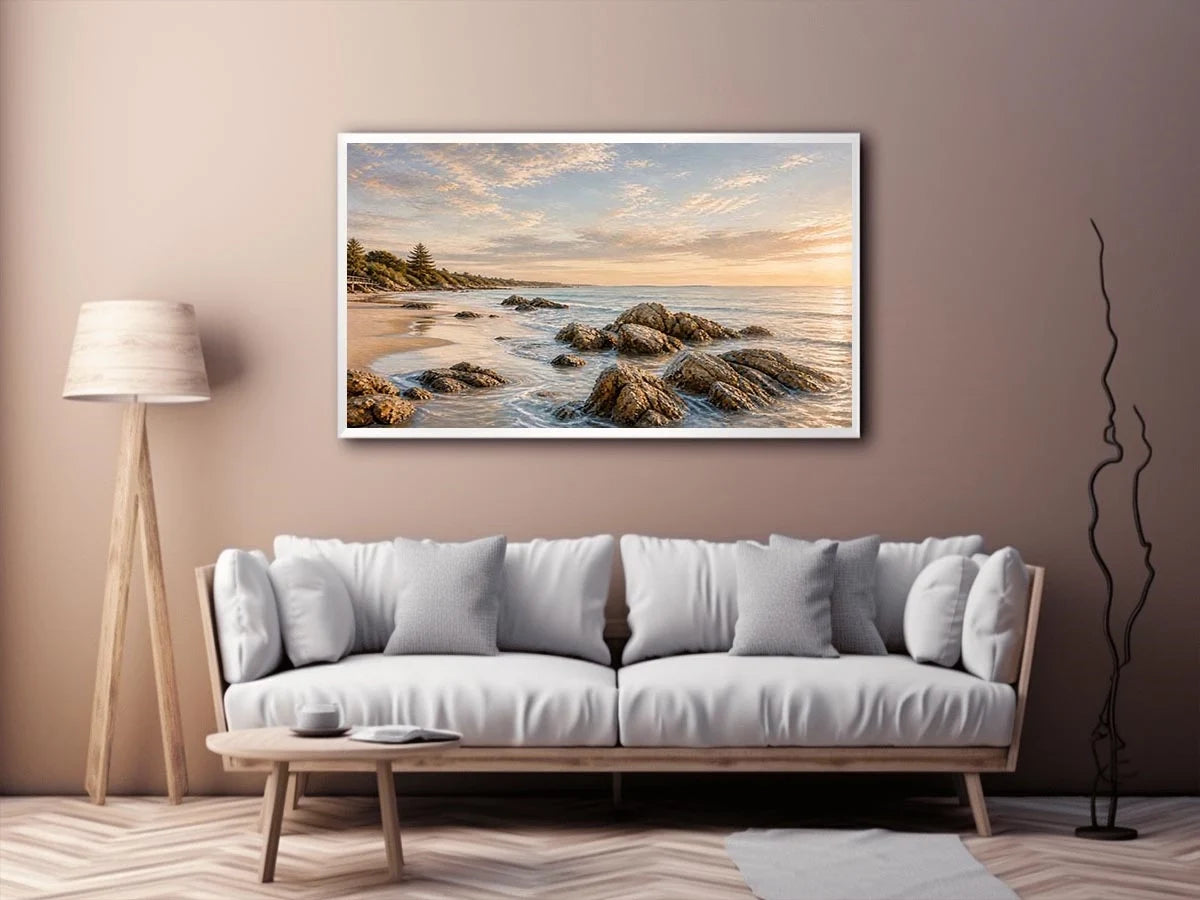 Rocky beach coastal wall art with golden sunset light, textured ocean waves, and serene shoreline landscape canvas for modern coastal interiors