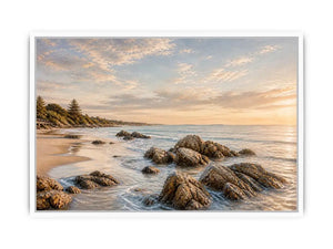 Rocky beach coastal wall art with golden sunset light, textured ocean waves, and serene shoreline landscape canvas for modern coastal interiors