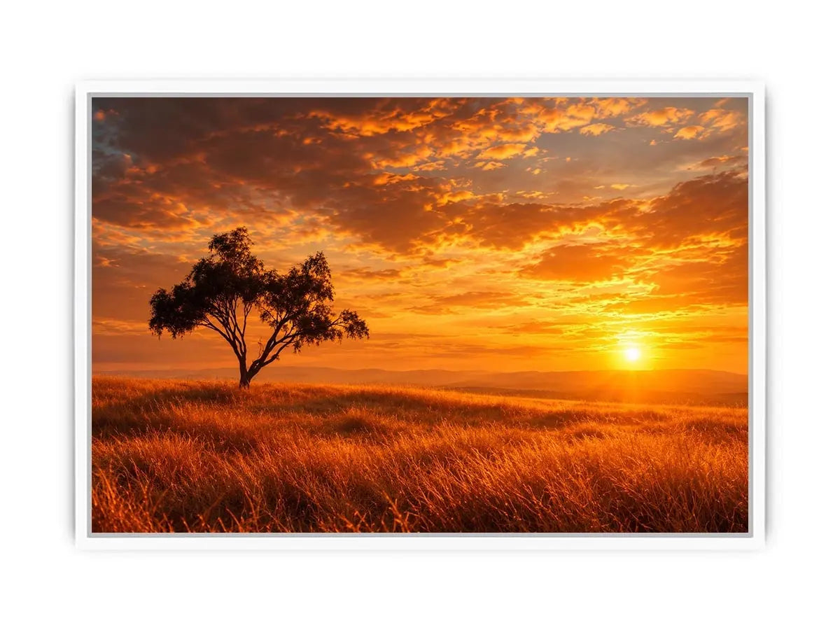 Lone tree sunset landscape canvas art for warm living room decor.