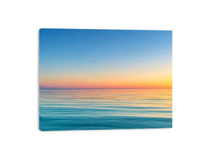 Pastel ocean horizon canvas art for calm coastal living room decor.