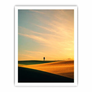 Lone figure desert canvas art with surreal warm tones for modern hallway decor.