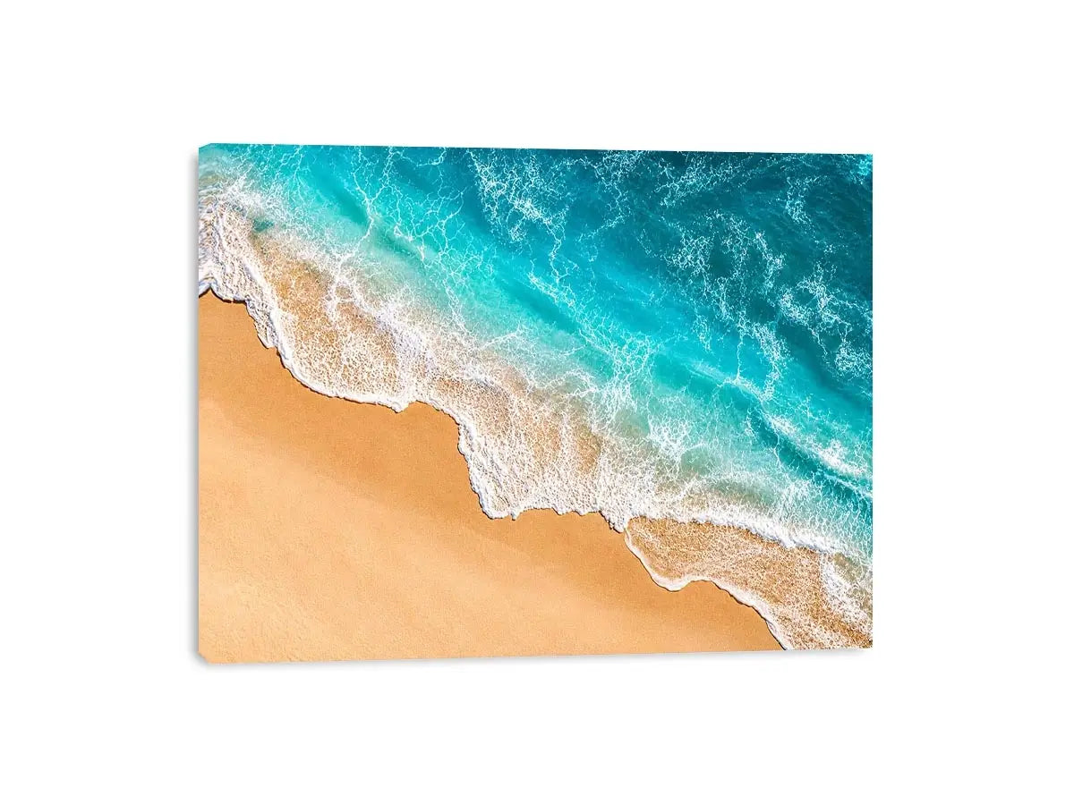 Aerial beach canvas print with aqua ocean waves for coastal living room decor.