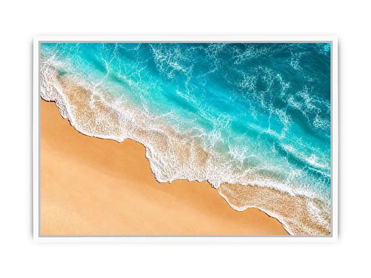 Aerial beach canvas print with aqua ocean waves for coastal living room decor.