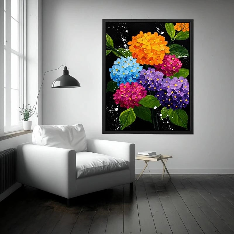 Colorful hydrangea bouquet canvas print with orange blue pink purple flowers green leaves black background and paint splatter details