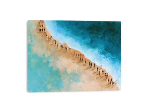 Aerial beach canvas art with turquoise water and walking figures for coastal living room decor.