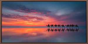 Panoramic camel sunset beach canvas art for coastal living room decor.