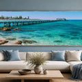 Turquoise seaside jetty canvas art with clear ocean water for coastal living room or beach house decor.