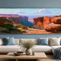 Red desert canyon canvas art with sandstone cliffs for warm southwestern living room decor.