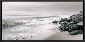 Neutral black and white coastal canvas art with rocks for calming bedroom decor.