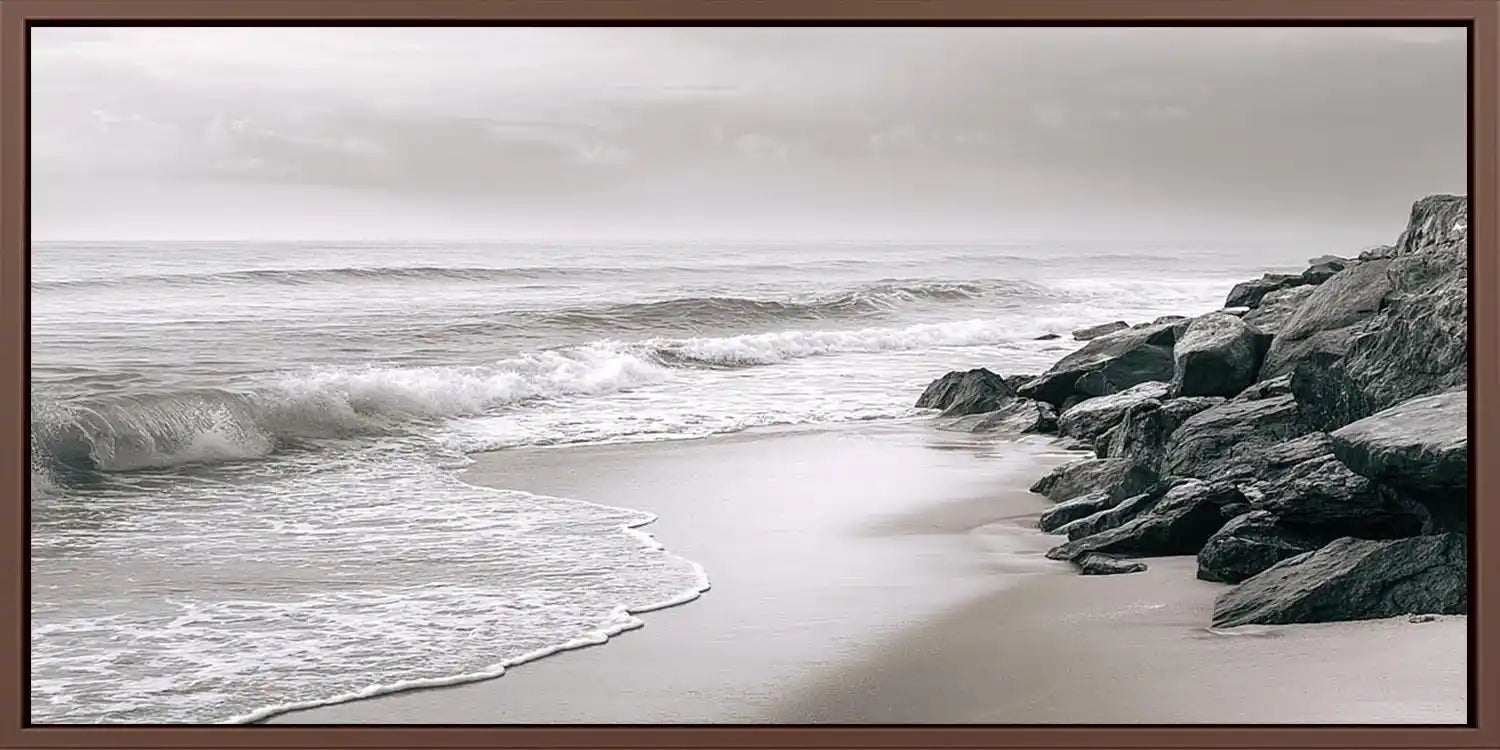 Neutral black and white coastal canvas art with rocks for calming bedroom decor.