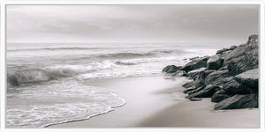 Neutral black and white coastal canvas art with rocks for calming bedroom decor.