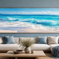 Panoramic turquoise ocean wave canvas art for coastal living room decor.