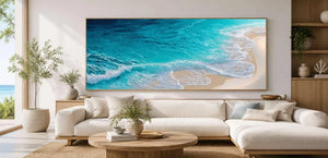 Turquoise aerial ocean canvas art for fresh coastal living room decor.