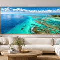 Aerial coral reef canvas art for tropical coastal office decor.