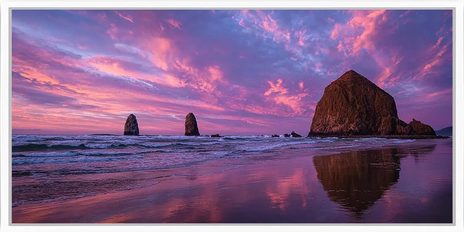 Purple sunset seastack canvas art for dramatic coastal living room decor.