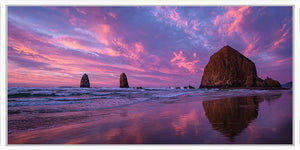Purple sunset seastack canvas art for dramatic coastal living room decor.