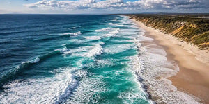 Moody aerial coastline canvas art for dramatic modern office decor.