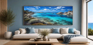 Bright turquoise cove canvas art with boats for beach house living room decor.