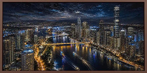 Night city skyline canvas art with bridge, river lights and dramatic reflections.