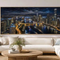 Night city skyline canvas art with bridge, river lights and dramatic reflections.