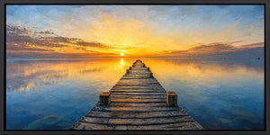 Sunset pier canvas print with calm water, wooden jetty and glowing horizon.