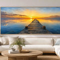 Sunset pier canvas print with calm water, wooden jetty and glowing horizon.