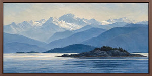 Blue mountain lake canvas art with island, snowy peaks and peaceful water.