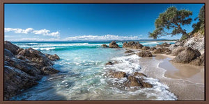 Tropical beach canvas art with pandanus tree and ocean waves for coastal decor.
