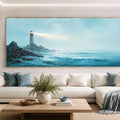 Coastal lighthouse canvas art overlooking ocean waves for serene living room decor