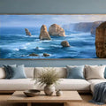 Dramatic sea stack coastal canvas art for luxury living room decor.