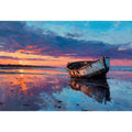 Boat on sunset beach