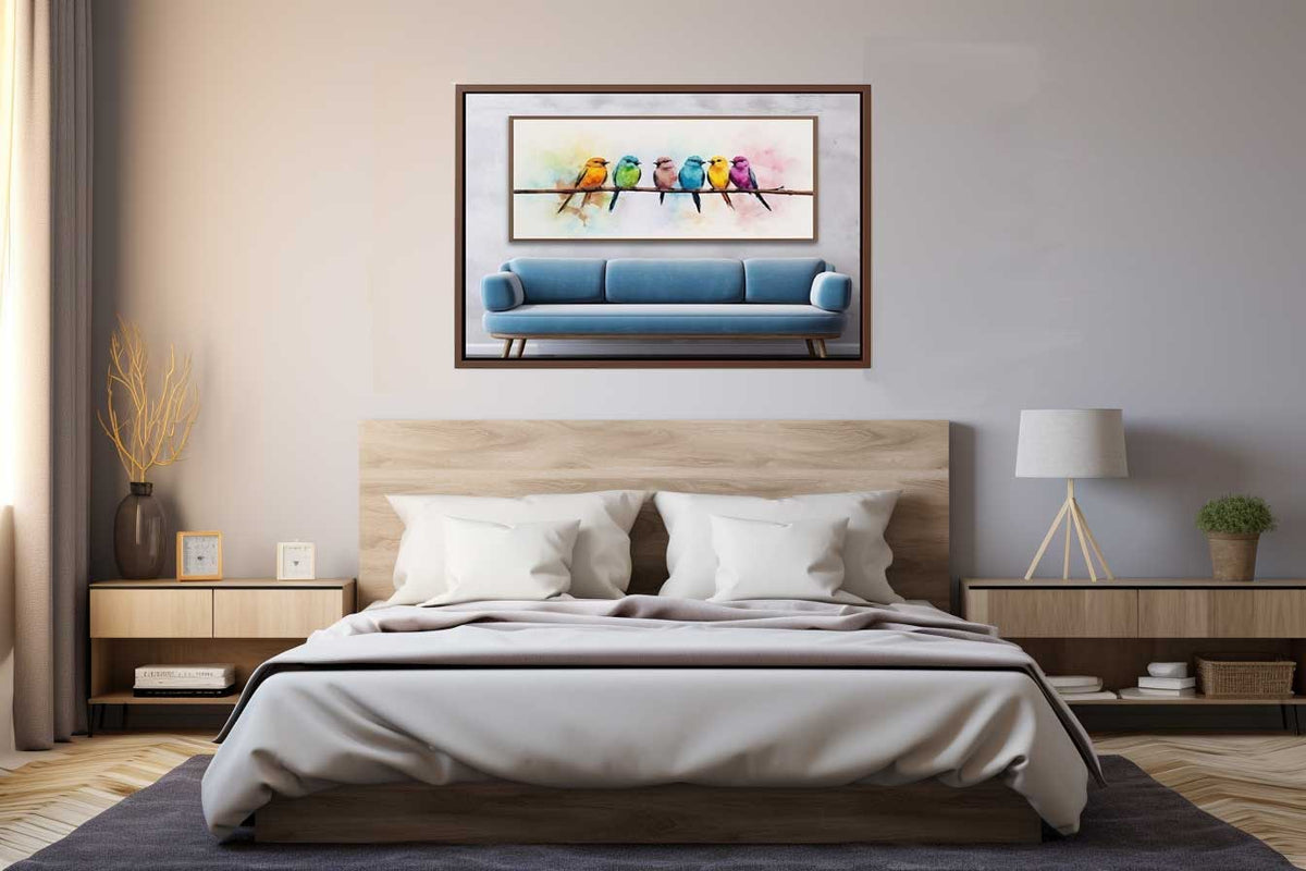 Colorful watercolor bird canvas art above sofa for cheerful decor.