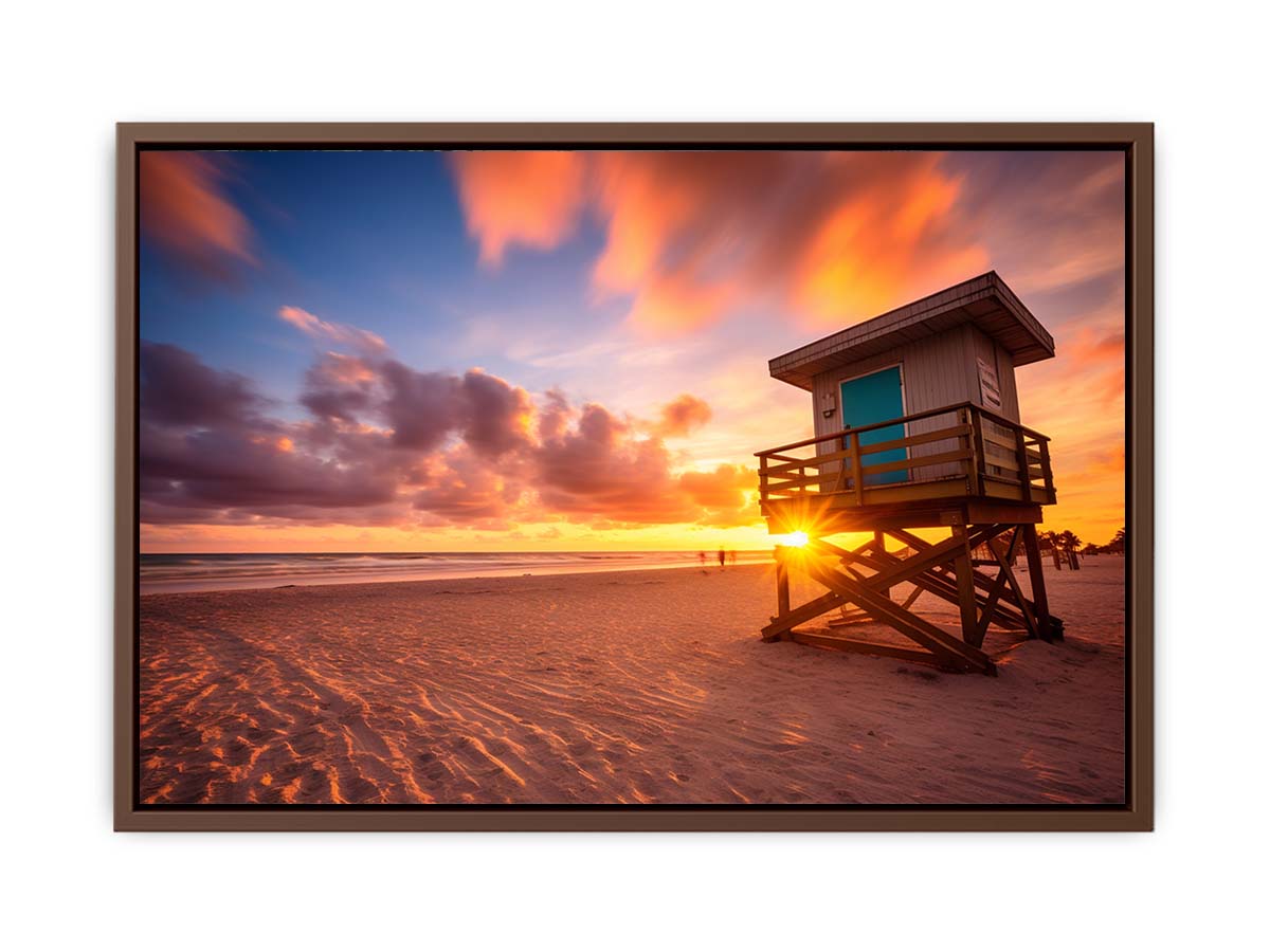 Beach sunset lifeguard wall art with warm sky for coastal bedroom decor.