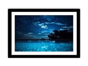 Celestial Pool Night star filled night sky above glowing turquoise pool water for modern home decor.